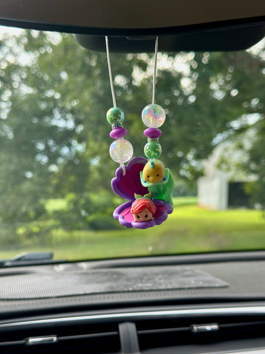 A LITTLE MERMAID AND A GUPPY CAR CHARM...