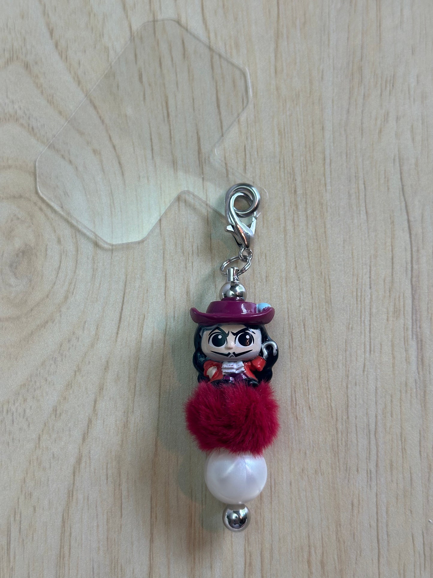 A CODFISH ON A HOOK PHONE CHARM...