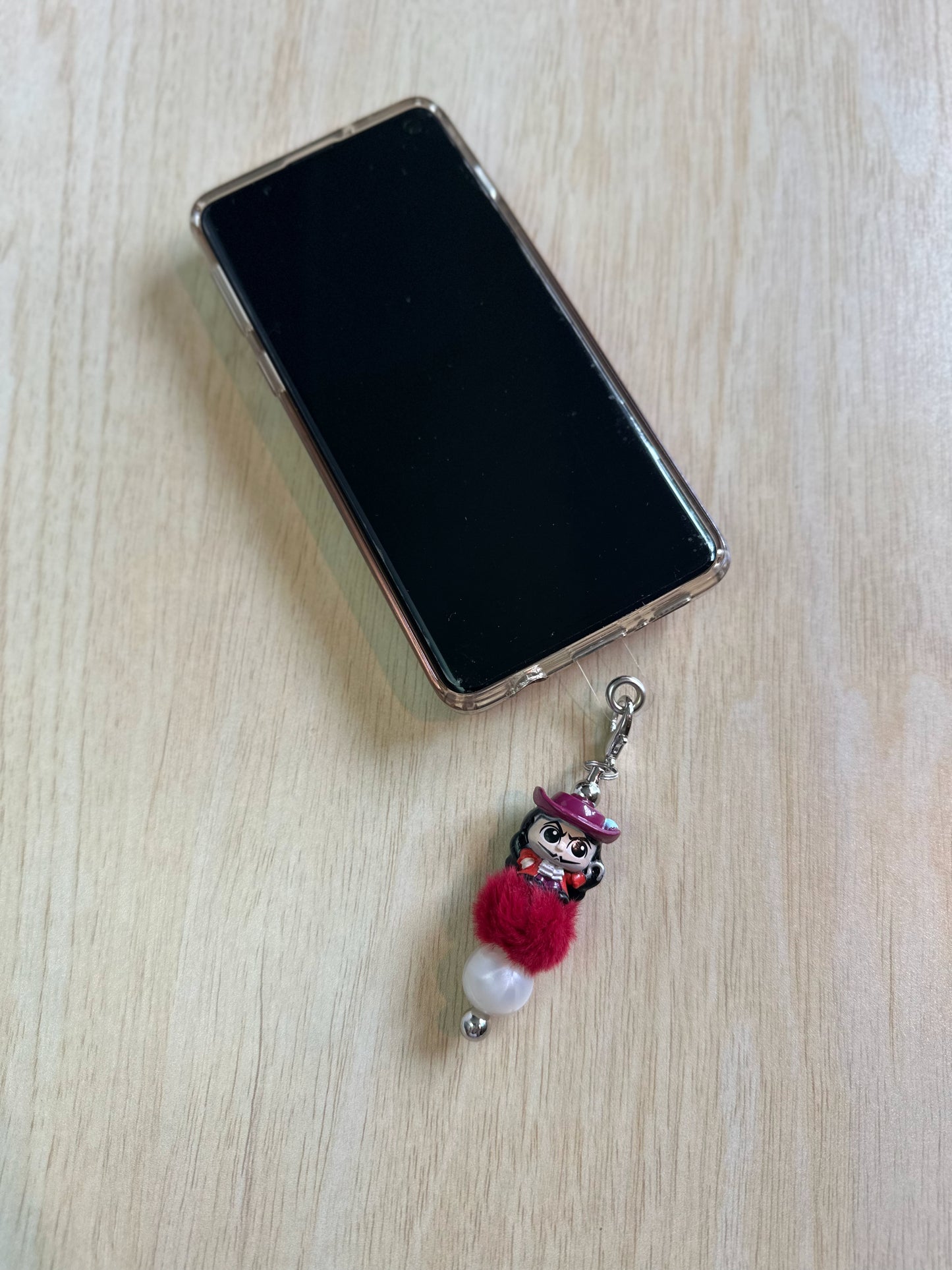 A CODFISH ON A HOOK PHONE CHARM...