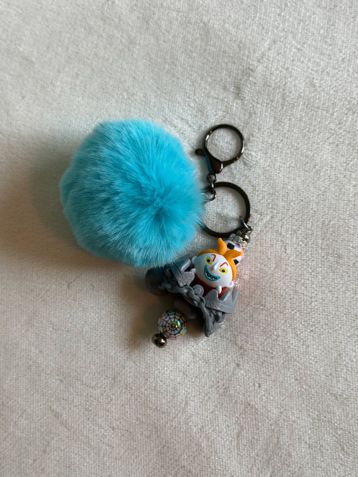 HE MIGHT BE THE DUMB ONE KEYCHAINS...