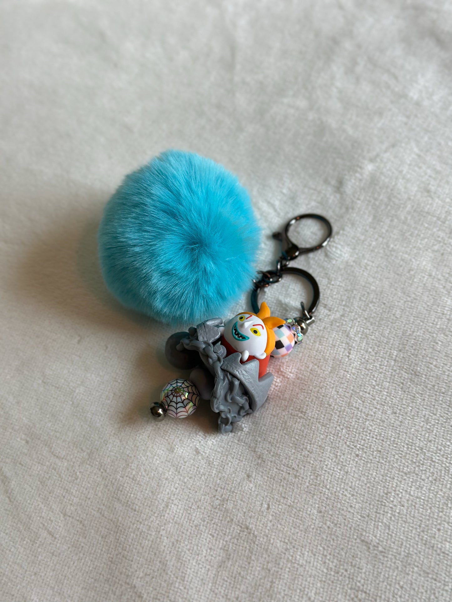 HE MIGHT BE THE DUMB ONE KEYCHAIN...