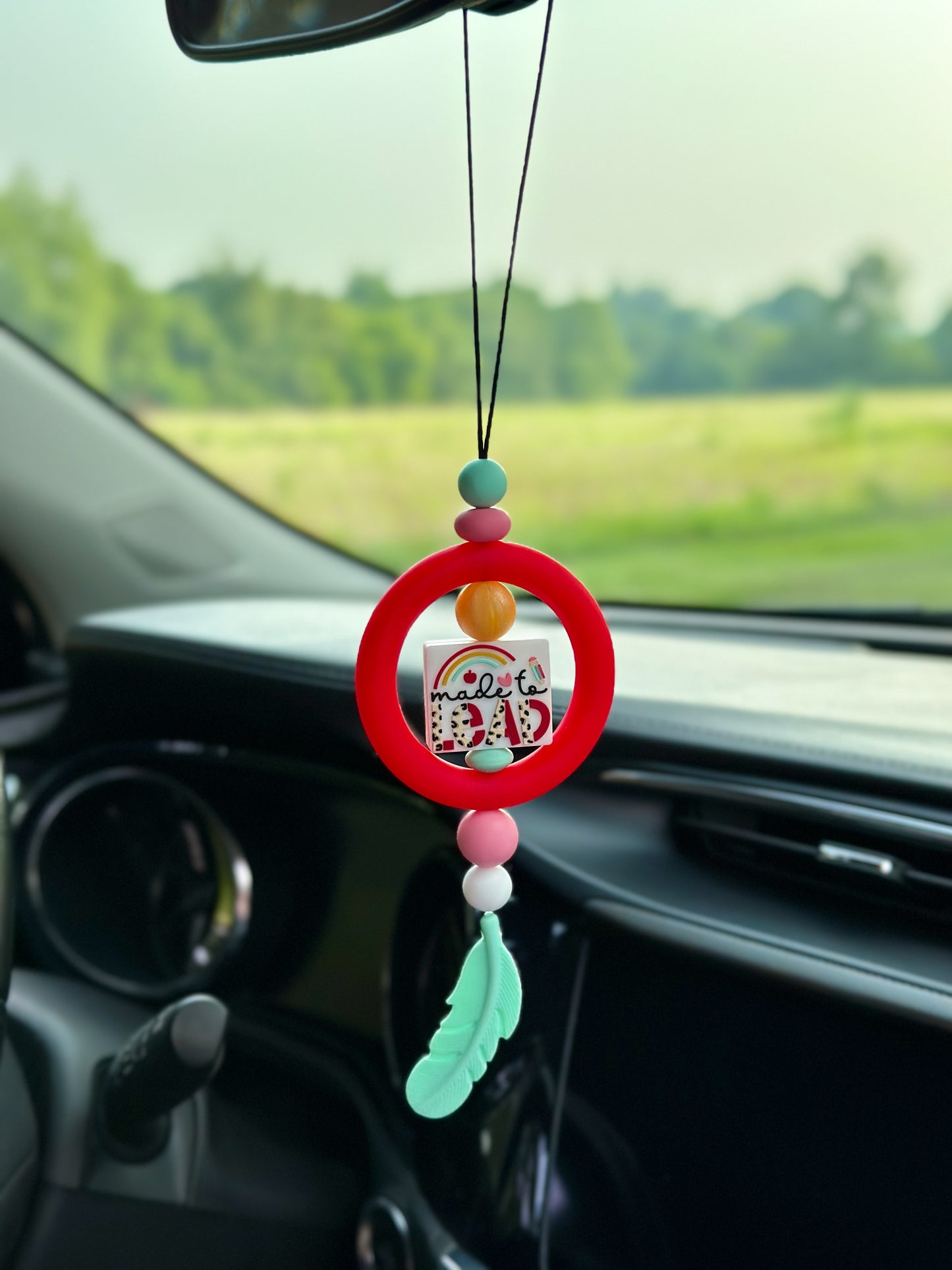 TEACHING IS LEADING CAR CHARM...