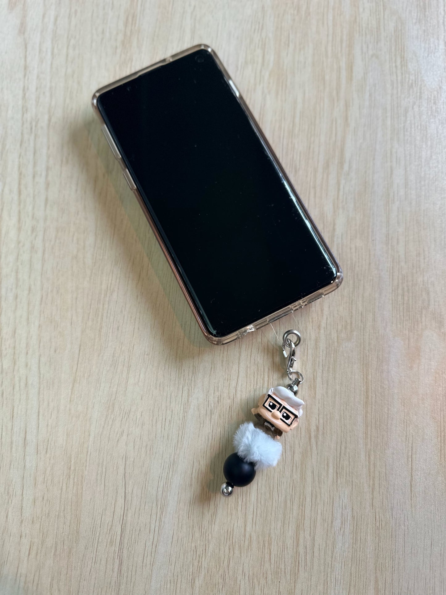 SPIRIT OF ADVENTURE PHONE CHARM...