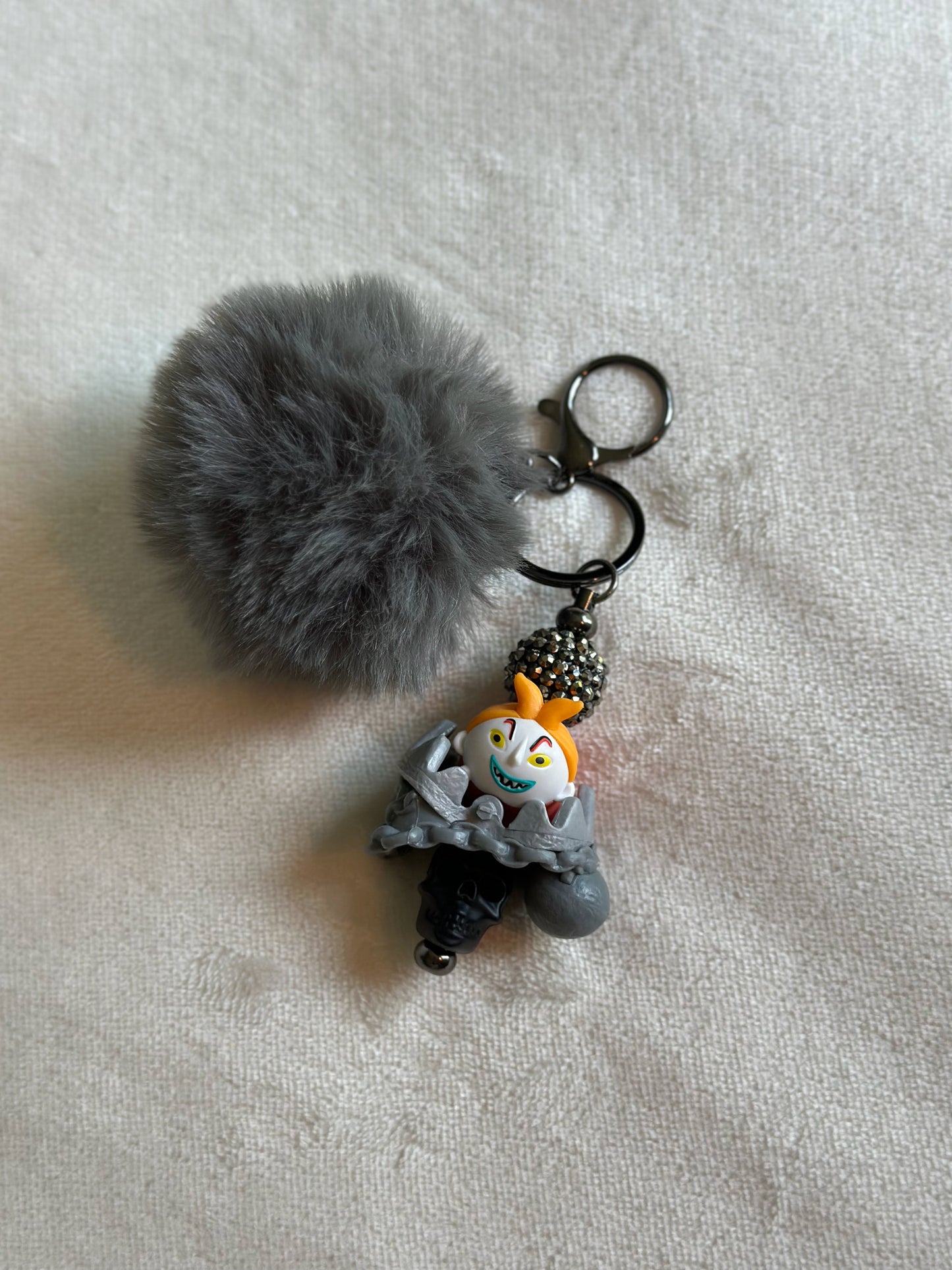 HE MIGHT BE THE DUMB ONE KEYCHAINS...