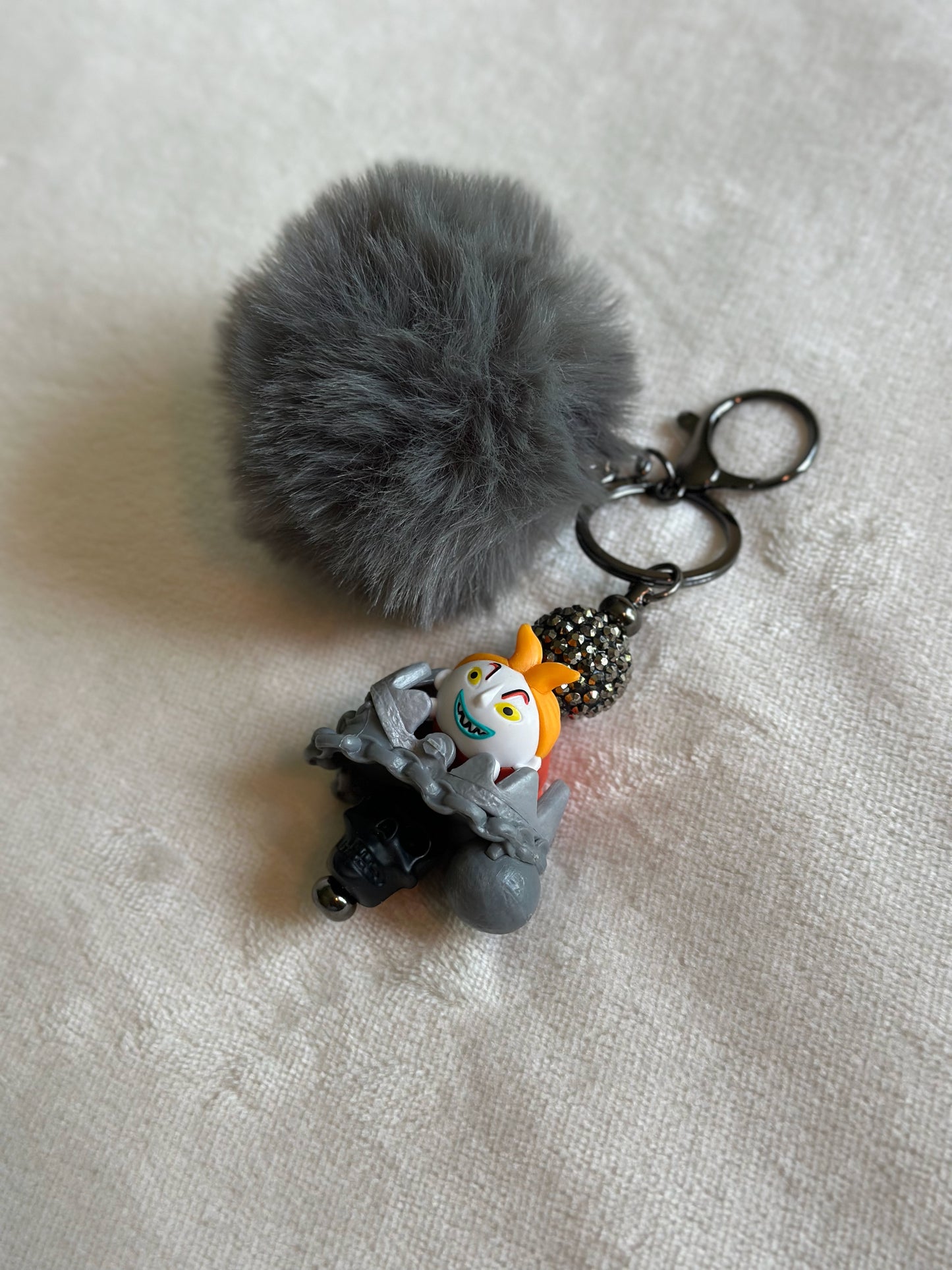 HE MIGHT BE THE DUMB ONE KEYCHAINS...