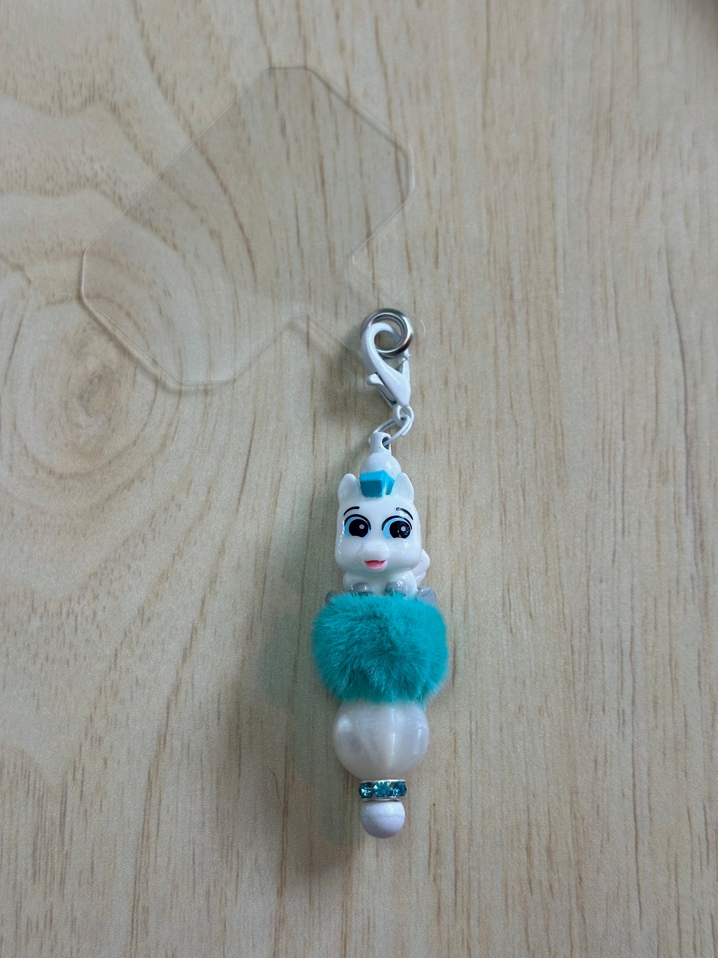 HORSE FEATHERS PHONE CHARM...