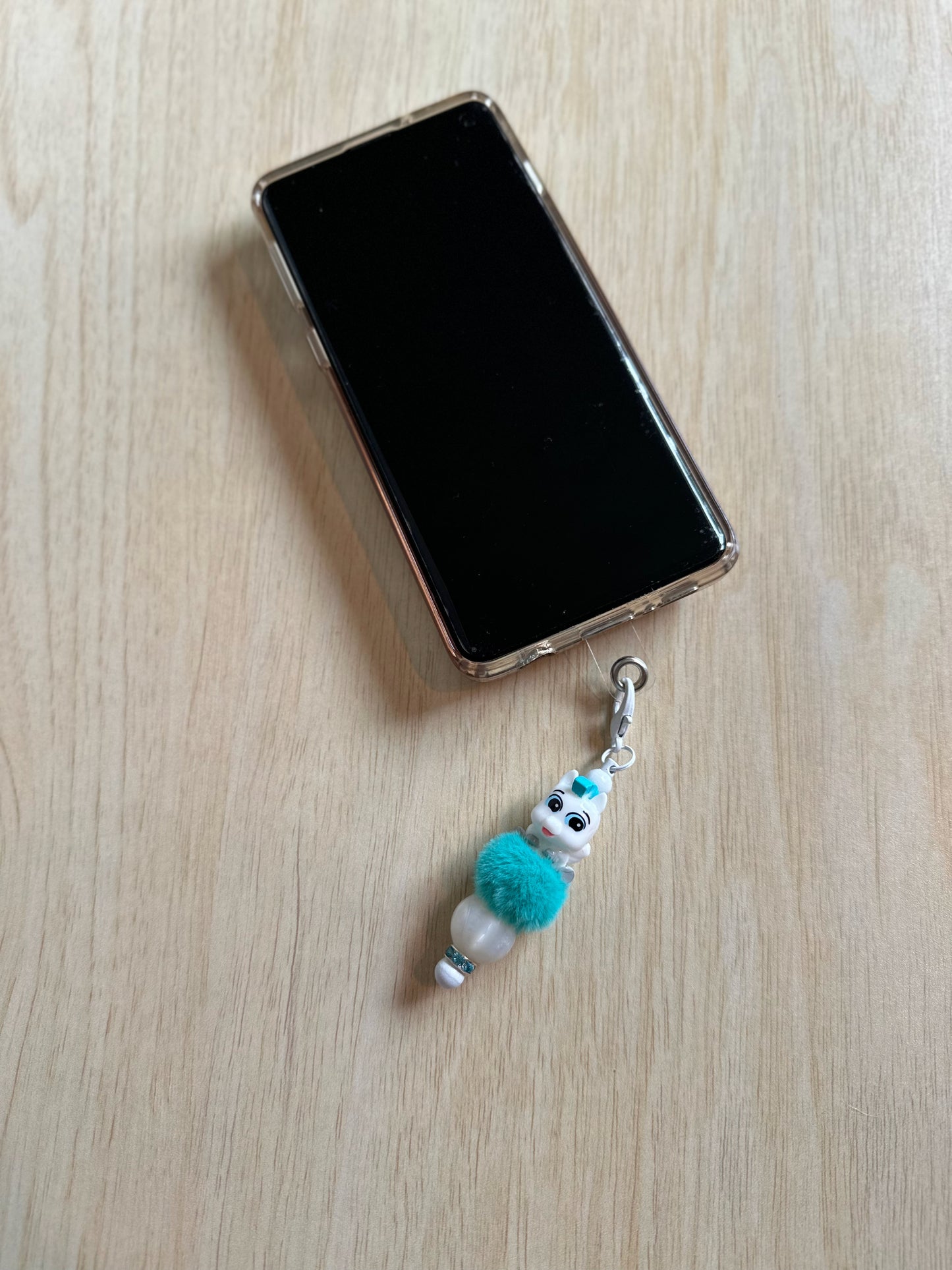 HORSE FEATHERS PHONE CHARM...